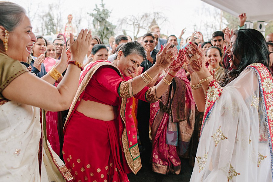 Bride and Groom's Family dancing during Baraat
