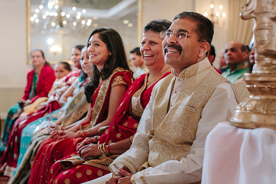 Family happy and laughing during Indian Wedding