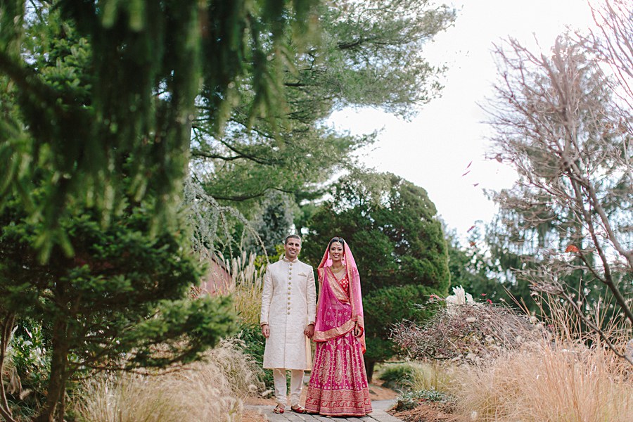 Traditional Bride and Groom Portrait wearing traditional Indian Outfits